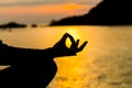 Silhouette, hand of Woman Meditating in Yoga pose or Lotus Posit Royalty Free Stock Photo