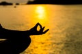 Silhouette, hand of Woman Meditating in Yoga pose or Lotus Posit Royalty Free Stock Photo