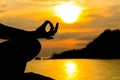 Silhouette, hand of Woman Meditating in Yoga pose or Lotus Posit Royalty Free Stock Photo