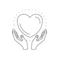 Silhouette hands with floating heart charity symbol