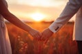 Silhouette of hands of woman and man reaching each other