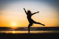 Silhouette of a happy beautiful dancer girl at sunset Royalty Free Stock Photo