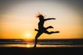 Silhouette of a happy beautiful dancer girl at sunset Royalty Free Stock Photo