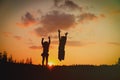 Silhouette of happy boy and girl enjoy sunset nature Royalty Free Stock Photo