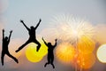 Silhouette happy business teamwork jumping and cheering crowd fireworks congratulation graduation in Happy New year 2020. Freedom