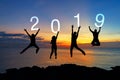Silhouette happy business teamwork jumping congratulation graduation in Happy New year 2019. Freedom lifestyle group people jump a Royalty Free Stock Photo
