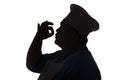 silhouette of a chef on a white isolated background, profile of a male face in a cook hat,food industry concept