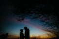 Silhouette of happy couple looking at each other and touching wi Royalty Free Stock Photo