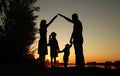 Silhouette of a happy family with children Royalty Free Stock Photo