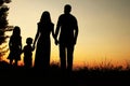 Silhouette of a happy family with children Royalty Free Stock Photo