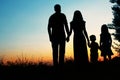 Silhouette of a happy family with children Royalty Free Stock Photo