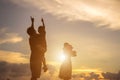 silhouette of happy family father mother and son playing outdoors a Royalty Free Stock Photo