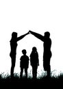 Silhouette of a happy family making the home sign Royalty Free Stock Photo