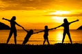 Silhouette of happy family who playing Royalty Free Stock Photo