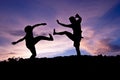 Silhouette happy jumping against beautiful in sunset. Freedom, e Royalty Free Stock Photo