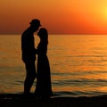 Silhouette of a happy loving couple at sunset Royalty Free Stock Photo