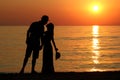 Silhouette of a happy loving couple at sunset Royalty Free Stock Photo