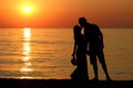 Silhouette of a happy loving couple at sunset Royalty Free Stock Photo