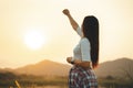 Silhouette happy success woman rising hands on mountain Royalty Free Stock Photo