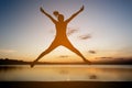 Silhouette of happy woman jumping Royalty Free Stock Photo