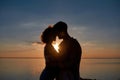 Silhouette of happy young couple hugging each other Royalty Free Stock Photo