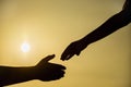 Silhouette of helping hand concept and international day of peace Royalty Free Stock Photo