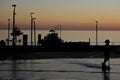 Silhouette of Henley Beach square and pier at dusk in Adelaide South Australia Royalty Free Stock Photo