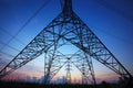 Silhouette of high voltage electric pole against beautiful dusky