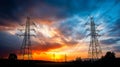 Silhouette of high voltage electrical tower against sunset and beautiful sky. Royalty Free Stock Photo