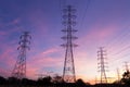 Silhouette high voltage electricity pylon on sunrise background Royalty Free Stock Photo
