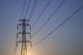 Silhouette High voltage electricity pylon sunset Royalty Free Stock Photo
