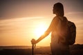 Silhouette hiker woman tracking with backpack