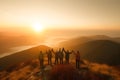 Silhouette of the hiking male and female hikers climbing up mountain, in winner pose, teamwork concept Royalty Free Stock Photo