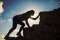 Silhouette hiking woman climb to montain peak Royalty Free Stock Photo