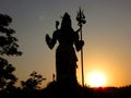 Silhouette of Hindu god Shiva at sunset Royalty Free Stock Photo