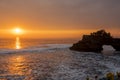 Silhouette of Hindu temple Pura Tanah Lot and sunset