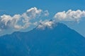 Silhouette of the holy mountains Athos and a small cloud above the mountain top, Chalkidiki Royalty Free Stock Photo