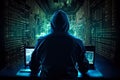 Silhouette of hooded computer hacker on background of multiple displays and digital information