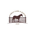 Silhouette Horse behind wooden fence paddock applied for the logo of vintage retro rustic countryside western country farm ranch. Royalty Free Stock Photo