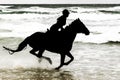 Silhouette Horse and Rider on beach Royalty Free Stock Photo