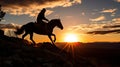 Silhouette of a horse rider on a cliff at sunset Royalty Free Stock Photo