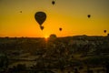 Silhouette of hot air balloons flying over the valley at Cappadocia, Anatolia, Turkey. Volcanic mountains in Goreme