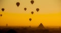 Silhouette of Hot Air Balloons over the temples of Bagan.Sunset orange sky background