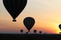 Silhouette of hot air balloons during sunrise. Royalty Free Stock Photo