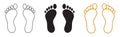 Silhouette of human footprints. Baby footsteps icon