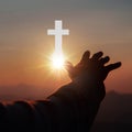 Silhouette of human hands palm up praying and worship of cross, eucharist therapy bless god helping, belief, forgiveness, freedom Royalty Free Stock Photo