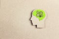 Silhouette human head with green brain and gears Royalty Free Stock Photo