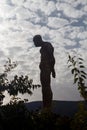 Silhouette of a human statue of stone