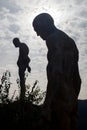 Silhouette of human statues of stone Royalty Free Stock Photo