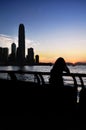 Silhouette of IFC skyscraper as seen from Wan Chai temporary promenade, Hong Kong Royalty Free Stock Photo